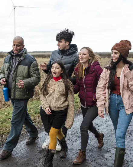 Group of five young people enjoying an Autumn walk